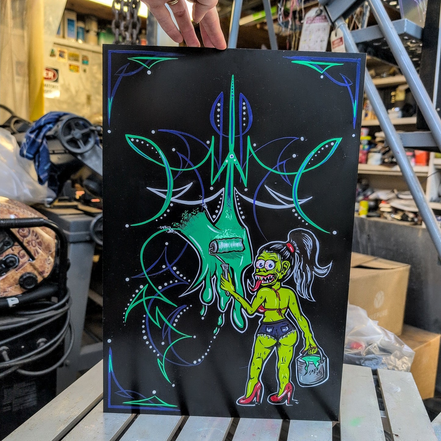 Monster Chick Painting a Panel